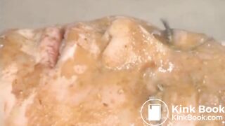 Japanese woman walks around in public covered in shit