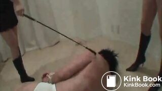 Two Japanese Mistress beating up a guy shitting on him