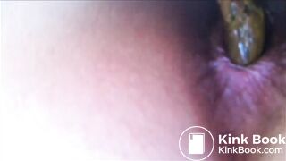 girl shitting in toilet close up