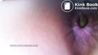 girl shitting in toilet close up