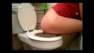 woman pooping in toilet - video 6