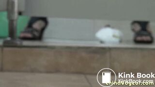 Girl in green dress pooping