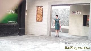 Girl in green dress pooping