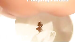 Two girls pooping on the toilet