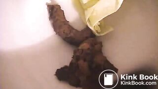woman pooping in toilet - video 2