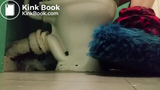 Girl with fluffy slippers pooping on the toilet