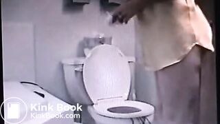 woman shitting out a big log