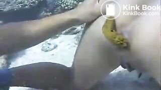 Two girls pooping underwater