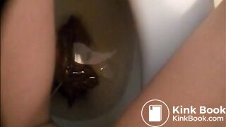 woman pooping in toilet - video 11
