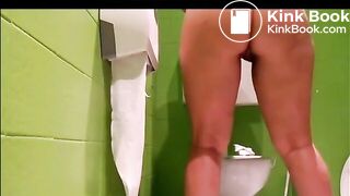 Gorgeous Italian girl is pooping on a public bathroom