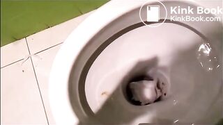 Gorgeous Italian girl is pooping on a public bathroom
