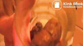 girl pooping into glass