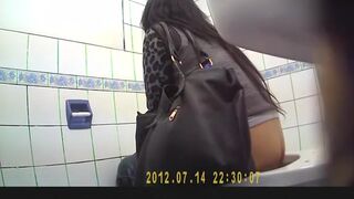 Brunette woman pooping