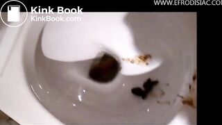 Gorgeous Italian girl is pooping on top of the toilet