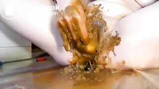 Stuffed her pussy with poop
