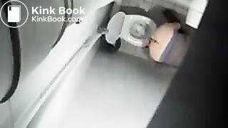 Overhead toilet voyeur