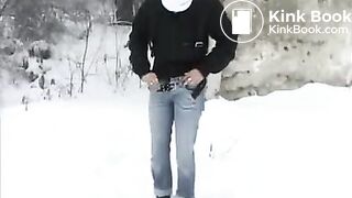 Woman pooping in the snow