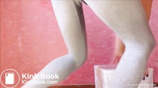 Beautiful brunette shits in grey pants