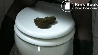 Cutie shits on the Toilet Lid