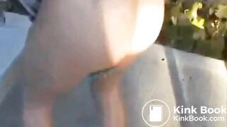 Girl shits near bench