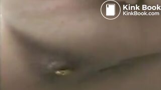 Blonde in a pink T-shirt scat on the street