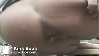 Blonde in a pink T-shirt scat on the street