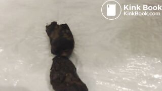 Girls drops big turd