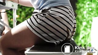 Woman 1eaking shit at the beer garden