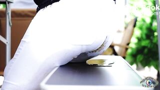 Woman 1eaking shit at the beer garden