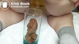 Pawg shitting in glass