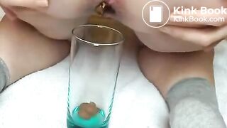 Pawg shitting in glass