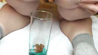 Pawg shitting in glass