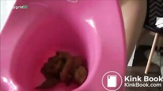 Sarah pooping in baby toilet