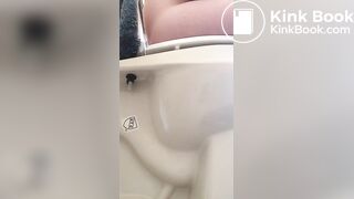 Girl pees and poops on toilet