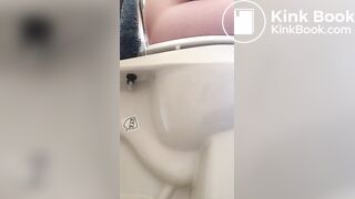 Girl pees and poops on toilet