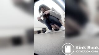 Beautiful girl having a shit and picking nose