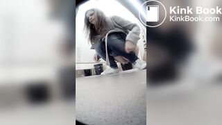 Beautiful girl having a shit and picking nose