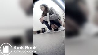 Beautiful girl having a shit and picking nose