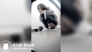 Beautiful girl having a shit and picking nose