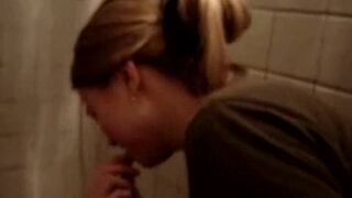 Students eating scat from public toilet