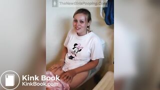 Girl pooping and straining on toilet