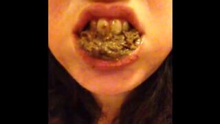 Pig chews and swallows her own shit.