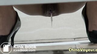 Chinese girl takes a thickest shit