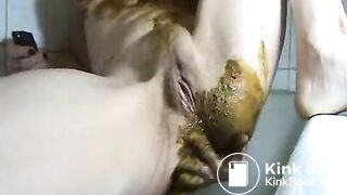 Solo female scat play in the bath