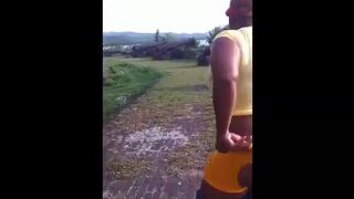 Big booty girl takes shit on grass