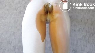 white-leggings-glass-toy-smearing/