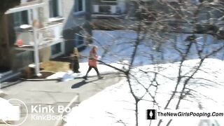 Black woman shitting on balcony