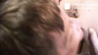 Slave chokes down a mouthful of shit