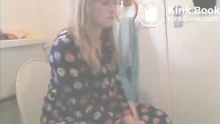 Girl on the toilet pooping - video 7