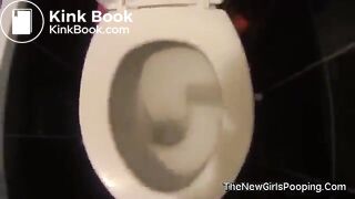 Girl having diarrhea in toilet